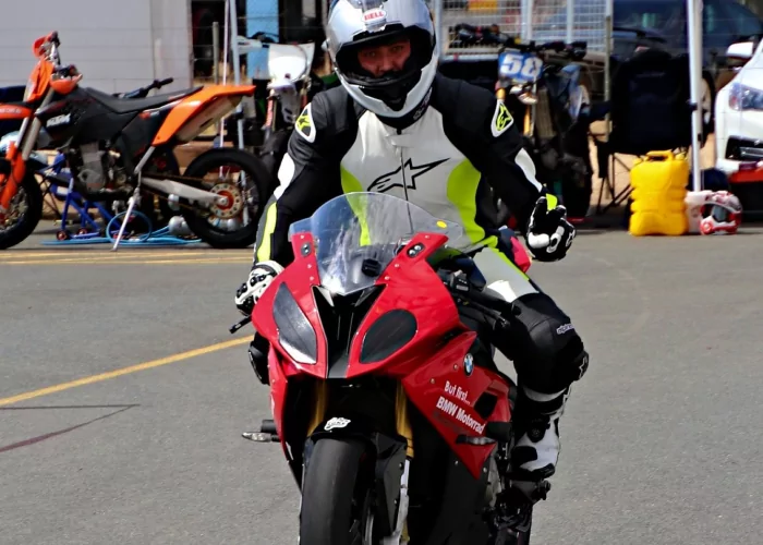 Track day rider on BMW motorcycle at MVTC, showing easy access and rider-friendly setup.